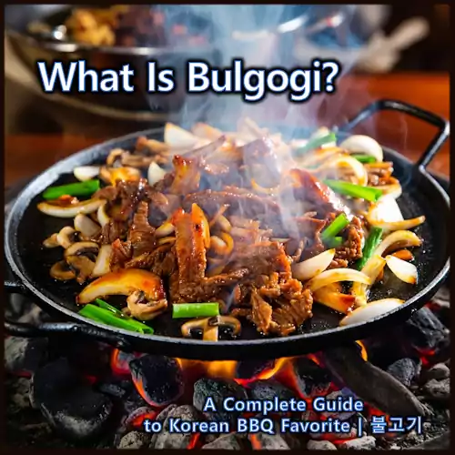 A close-up shot of thin-sliced beef bulgogi sizzling on a hot Korean BBQ grill